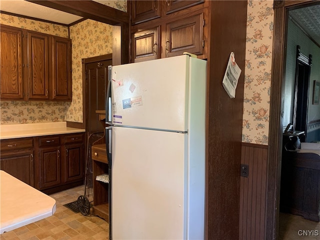 kitchen featuring white fridge