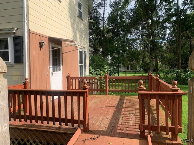 deck featuring a yard