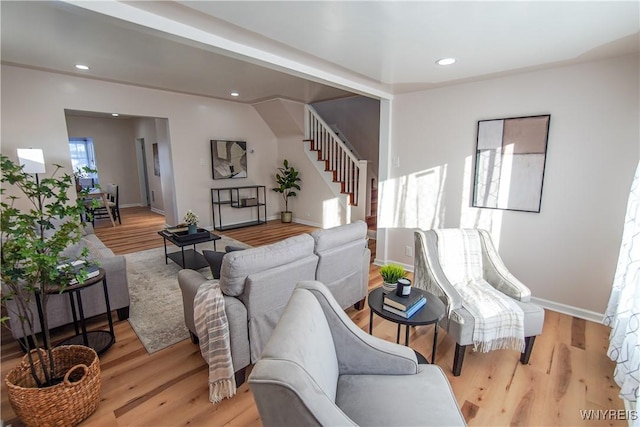 living room with light hardwood / wood-style floors