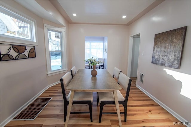 dining area featuring hardwood / wood-style flooring