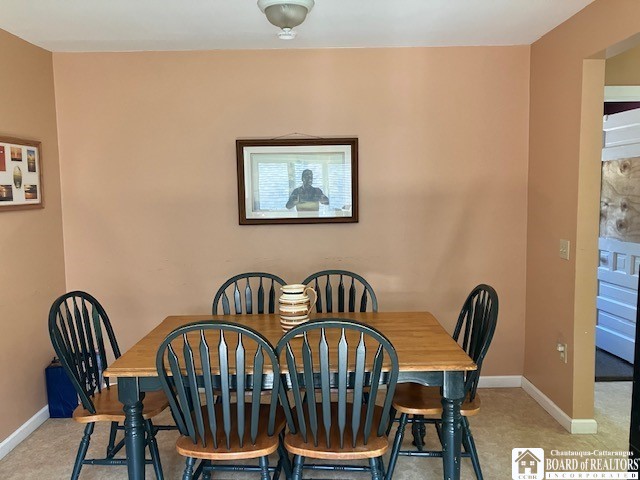 view of carpeted dining room