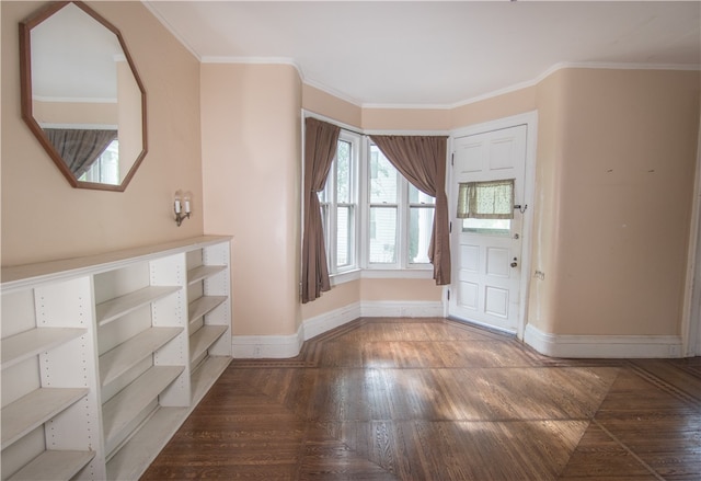 entrance foyer with parquet floors and crown molding