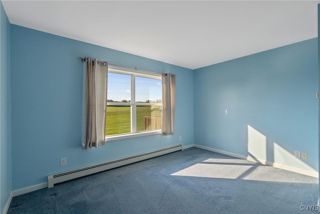 carpeted empty room featuring a baseboard radiator