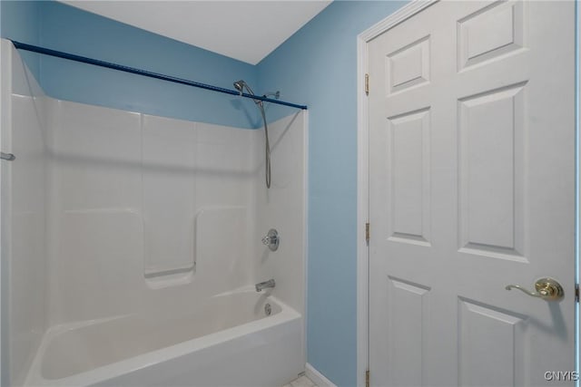 bathroom with shower / tub combination