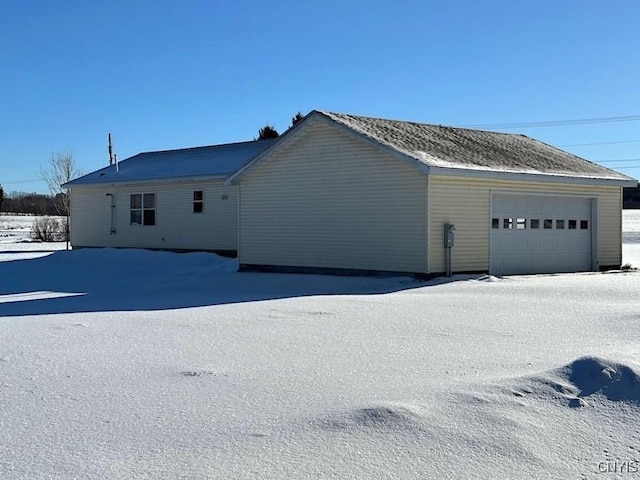 exterior space featuring a garage