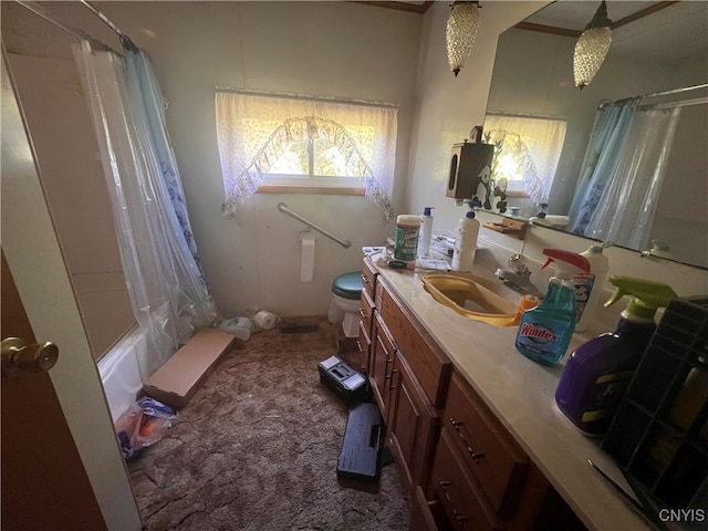 full bathroom featuring shower / bath combo, vanity, and toilet