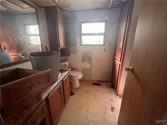 bathroom featuring toilet