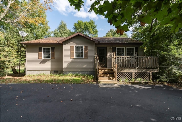 view of front of property with a deck