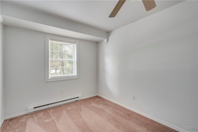 carpeted empty room with a baseboard radiator and ceiling fan