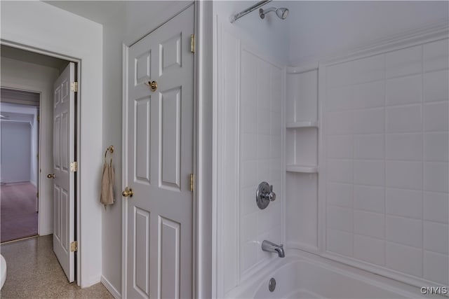 bathroom featuring  shower combination