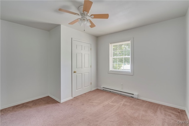 unfurnished bedroom featuring light carpet, ceiling fan, a closet, and a baseboard radiator