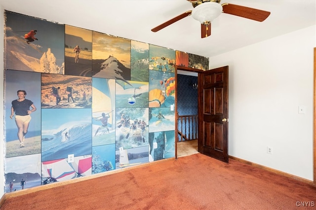 empty room with carpet and ceiling fan