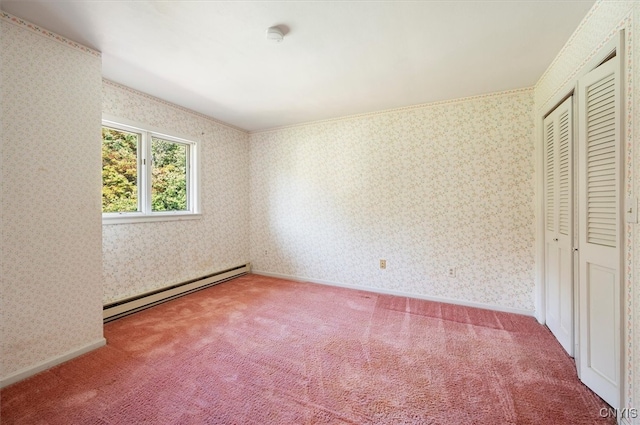 unfurnished bedroom with carpet floors, ornamental molding, a closet, and a baseboard radiator