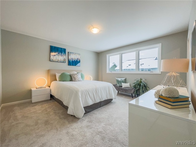 bedroom featuring carpet