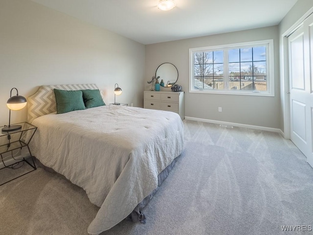 203 Carriage Ln, West Seneca, NY 14224 - bedroom with light colored carpet and baseboards