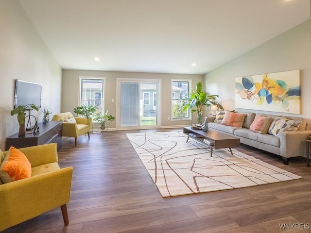 203 Carriage Ln, West Seneca, NY 14224 - living area with vaulted ceiling, wood finished floors, recessed lighting, and baseboards