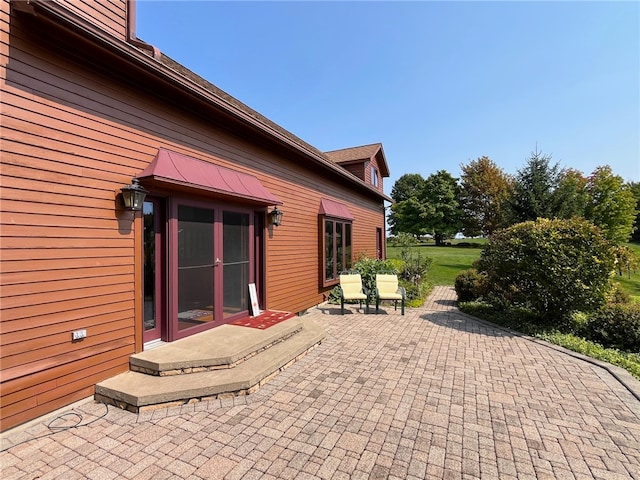 view of patio featuring french doors