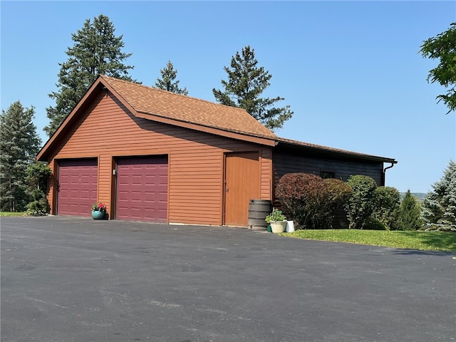 garage with wood walls