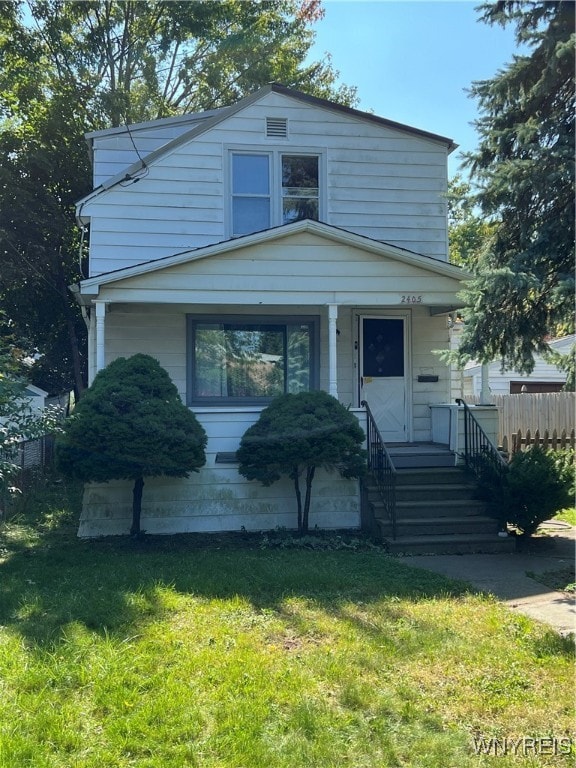 view of front of home with a front yard