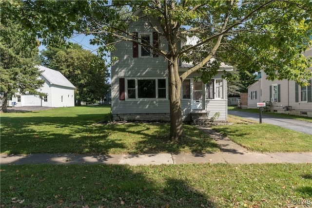 view of front facade featuring a front yard