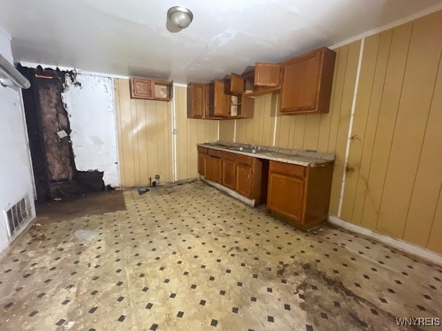 kitchen with wood walls