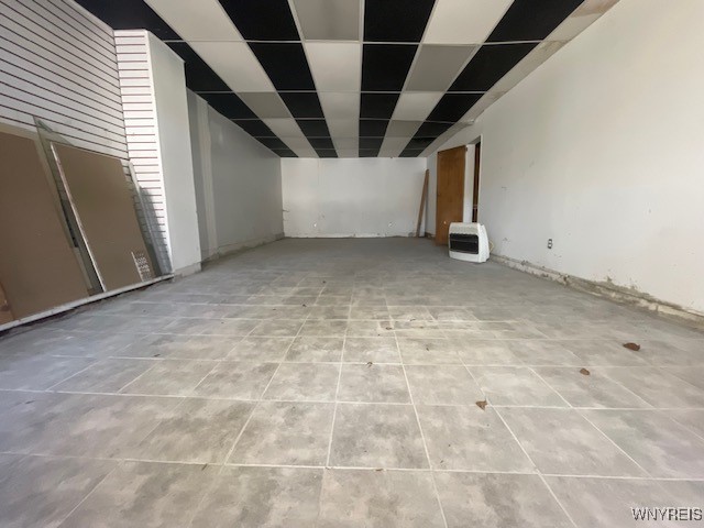 empty room with a drop ceiling