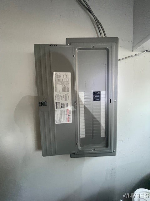 utility room featuring electric panel