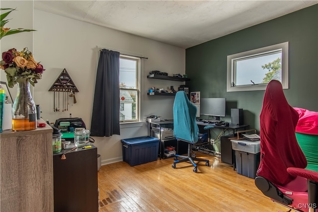 home office featuring hardwood / wood-style flooring and plenty of natural light