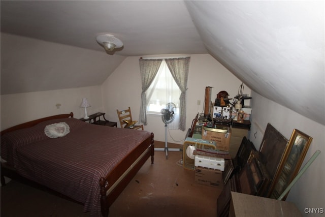 bedroom featuring vaulted ceiling