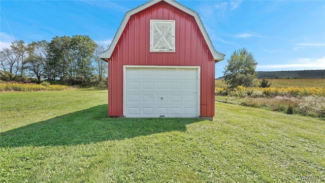 garage featuring a yard