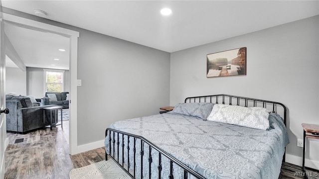 bedroom featuring hardwood / wood-style flooring