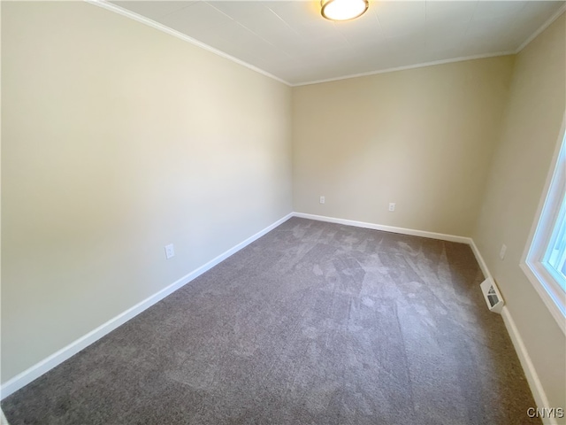 carpeted empty room with crown molding