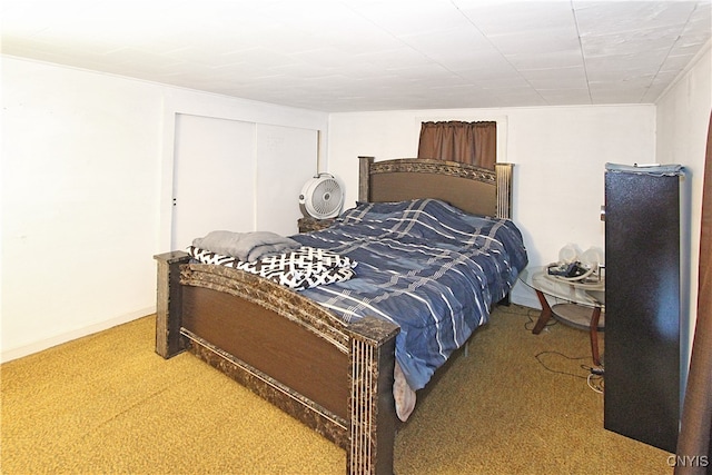 bedroom featuring a closet and carpet