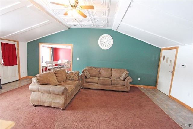 carpeted living room with ceiling fan, baseboards, and vaulted ceiling