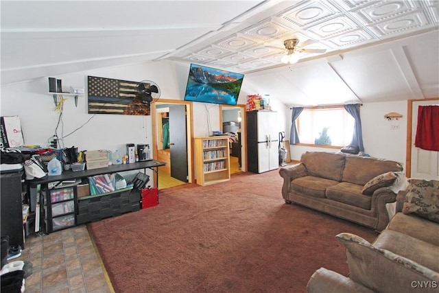 living area featuring lofted ceiling and ceiling fan