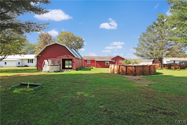 view of yard with an outdoor pool