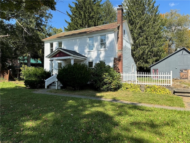 view of home's exterior featuring a lawn