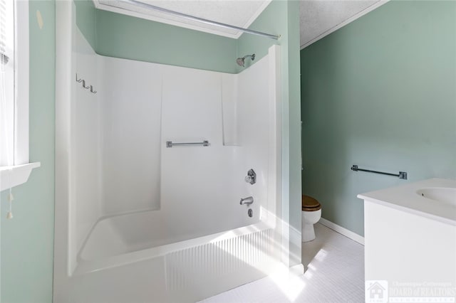 full bathroom with tub / shower combination, vanity, tile patterned flooring, and toilet