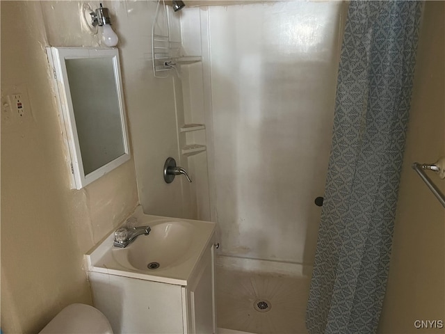 bathroom featuring vanity and walk in shower