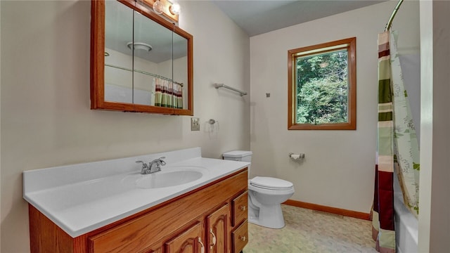 full bathroom with vanity, toilet, and shower / bath combination with curtain