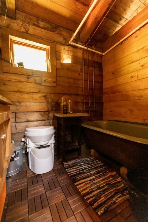 view of sauna / steam room featuring wood ceiling and wooden walls