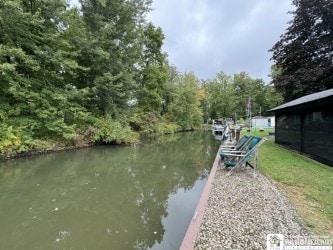 dock area with a water view