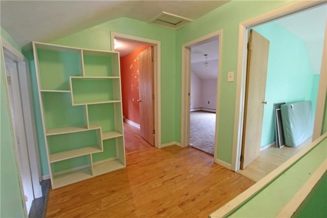 closet featuring a baseboard heating unit