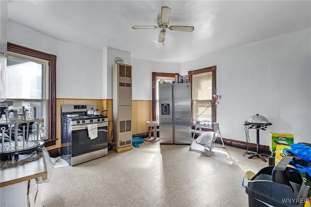 workout room featuring ceiling fan