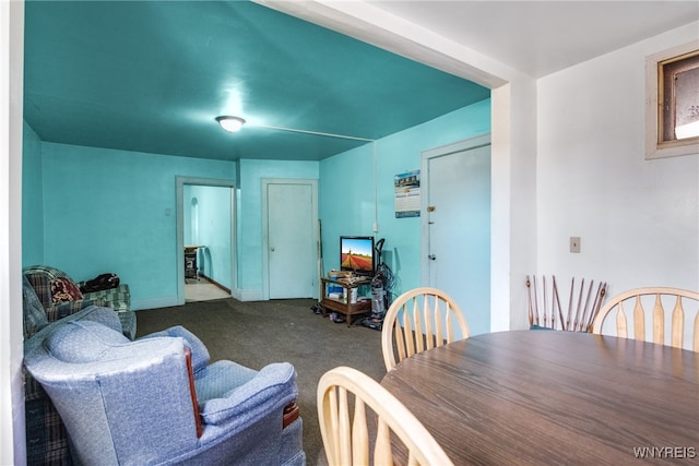 dining room featuring carpet flooring