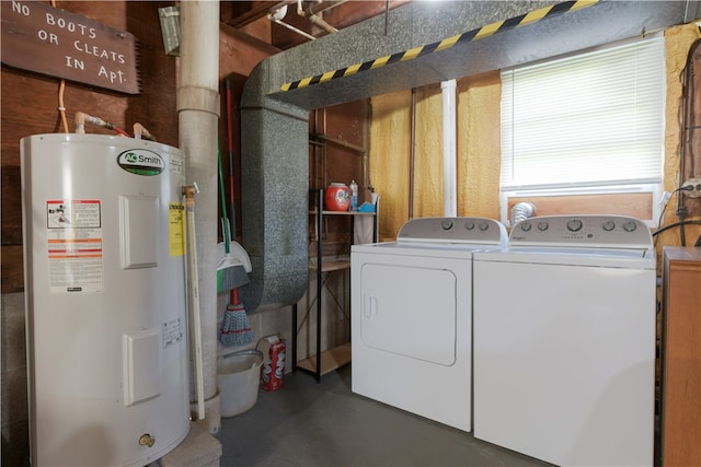 laundry area with water heater and washing machine and dryer