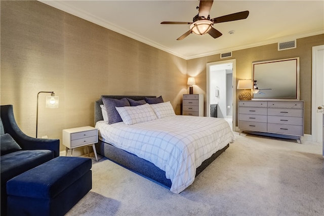 carpeted bedroom featuring ceiling fan, connected bathroom, and ornamental molding