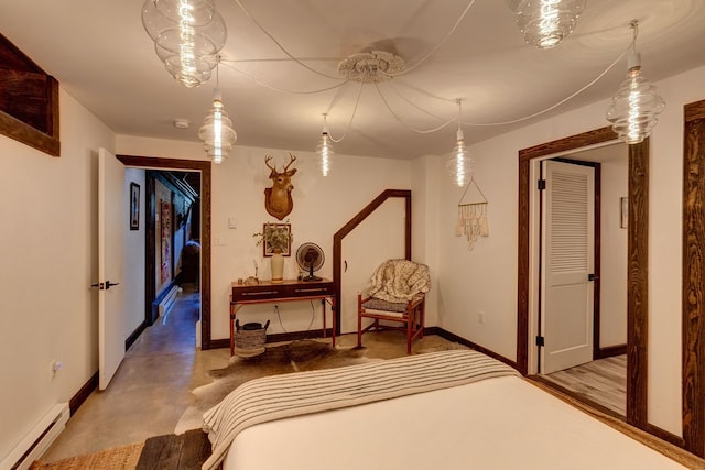 bedroom featuring a baseboard heating unit