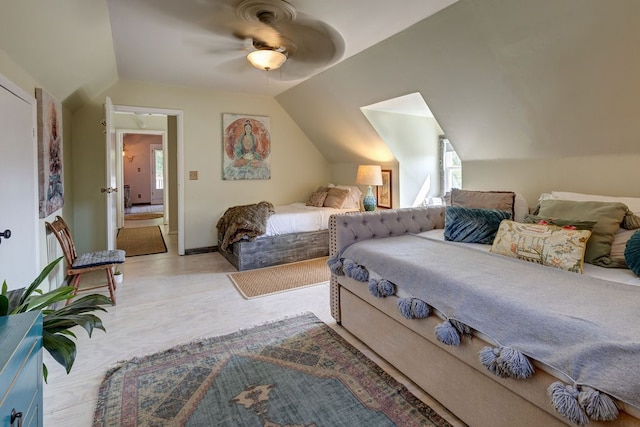 bedroom featuring ceiling fan and lofted ceiling