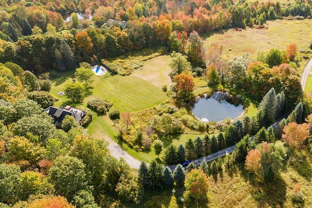 birds eye view of property with a rural view and a water view